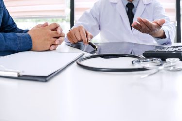 doctor-consultation-with-patient-in-hospital-offic-2026-03-18-04-20-43-utc (1)